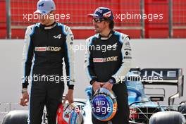 (L to R): Esteban Ocon (FRA) Alpine F1 Team with Fernando Alonso (ESP) Alpine F1 Team. 12.03.2021. Formula 1 Testing, Sakhir, Bahrain, Day One.