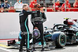 (L to R): Valtteri Bottas (FIN) Mercedes AMG F1 and Lewis Hamilton (GBR) Mercedes AMG F1. 12.03.2021. Formula 1 Testing, Sakhir, Bahrain, Day One.