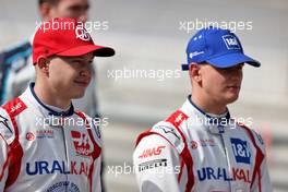 Nikita Mazepin (RUS) Haas F1 Team with Mick Schumacher (GER) Haas F1 Team. 12.03.2021. Formula 1 Testing, Sakhir, Bahrain, Day One.