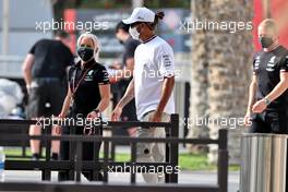 Lewis Hamilton (GBR) Mercedes AMG F1 with Angela Cullen (NZL) Mercedes AMG F1 Physiotherapist. 12.03.2021. Formula 1 Testing, Sakhir, Bahrain, Day One.
