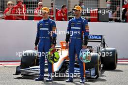 (L to R): Lando Norris (GBR) McLaren MCL35M and Daniel Ricciardo (AUS) McLaren. 12.03.2021. Formula 1 Testing, Sakhir, Bahrain, Day One.