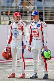 (L to R): Nikita Mazepin (RUS) Haas F1 Team and Mick Schumacher (GER) Haas F1 Team. 12.03.2021. Formula 1 Testing, Sakhir, Bahrain, Day One.