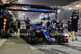 Esteban Ocon (FRA) Alpine F1 Team A521 practices a pit stop. 12.03.2021. Formula 1 Testing, Sakhir, Bahrain, Day One.