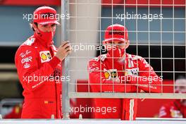 (L to R): Carlos Sainz Jr (ESP) Ferrari and Charles Leclerc (MON) Ferrari. 12.03.2021. Formula 1 Testing, Sakhir, Bahrain, Day One.