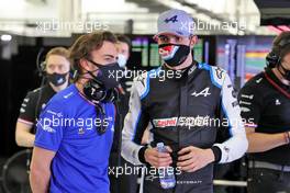 (L to R): Fernando Alonso (ESP) Alpine F1 Team with Esteban Ocon (FRA) Alpine F1 Team. 12.03.2021. Formula 1 Testing, Sakhir, Bahrain, Day One.