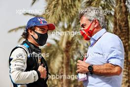 (L to R): Fernando Alonso (ESP) Alpine F1 Team with Carlos Sainz (ESP). 13.03.2021. Formula 1 Testing, Sakhir, Bahrain, Day Two.