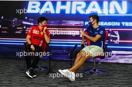 (L to R): Charles Leclerc (MON) Ferrari and George Russell (GBR) Williams Racing in the FIA Press Conference. 13.03.2021. Formula 1 Testing, Sakhir, Bahrain, Day Two.