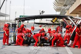 Charles Leclerc (MON) Ferrari SF-21 practices a pit stop. 13.03.2021. Formula 1 Testing, Sakhir, Bahrain, Day Two.