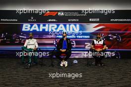 (L to R): Sebastian Vettel (GER) Aston Martin F1 Team; Esteban Ocon (FRA) Alpine F1 Team; and Kimi Raikkonen (FIN) Alfa Romeo Racing, in the FIA Press Conference. 13.03.2021. Formula 1 Testing, Sakhir, Bahrain, Day Two.
