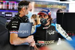 Fernando Alonso (ESP) Alpine F1 Team with Karel Loos (BEL) Alpine F1 Team Race Engineer. 14.03.2021. Formula 1 Testing, Sakhir, Bahrain, Day Three.