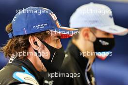(L to R): Fernando Alonso (ESP) Alpine F1 Team and Esteban Ocon (FRA) Alpine F1 Team. 14.03.2021. Formula 1 Testing, Sakhir, Bahrain, Day Three.