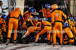 Daniel Ricciardo (AUS) McLaren MCL35M practices a pit stop. 14.03.2021. Formula 1 Testing, Sakhir, Bahrain, Day Three.