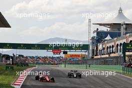 Charles Leclerc (MON) Ferrari SF-21 and Yuki Tsunoda (JPN) AlphaTauri AT02. 08.10.2021 Formula 1 World Championship, Rd 16, Turkish Grand Prix, Istanbul, Turkey, Practice Day.