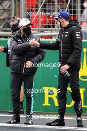 (L to R): Valtteri Bottas (FIN) Mercedes AMG F1 with Esteban Ocon (FRA) Alpine F1 Team on the grid. 10.10.2021. Formula 1 World Championship, Rd 16, Turkish Grand Prix, Istanbul, Turkey, Race Day.