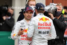 (L to R): third placed Sergio Perez (MEX) Red Bull Racing with second placed team mate Valtteri Bottas (FIN) Mercedes AMG F1 in parc ferme at the end of the race. 10.10.2021. Formula 1 World Championship, Rd 16, Turkish Grand Prix, Istanbul, Turkey, Race Day.