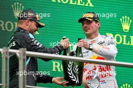 (L to R): Race winner Valtteri Bottas (FIN) Mercedes AMG F1 celebrates on the podium with second placed Max Verstappen (NLD) Red Bull Racing. 10.10.2021. Formula 1 World Championship, Rd 16, Turkish Grand Prix, Istanbul, Turkey, Race Day.