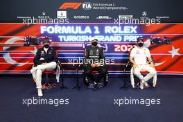 (L to R): Max Verstappen (NLD) Red Bull Racing; Valtteri Bottas (FIN) Mercedes AMG F1; and Sergio Perez (MEX) Red Bull Racing, in the post race FIA Press Conference. 10.10.2021. Formula 1 World Championship, Rd 16, Turkish Grand Prix, Istanbul, Turkey, Race Day.
