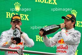 (L to R): Max Verstappen (NLD) Red Bull Racing celebrates his second position on the podium with third placed team mate Sergio Perez (MEX) Red Bull Racing. 10.10.2021. Formula 1 World Championship, Rd 16, Turkish Grand Prix, Istanbul, Turkey, Race Day.