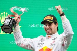 Sergio Perez (MEX) Red Bull Racing celebrates his third position on the podium. 10.10.2021. Formula 1 World Championship, Rd 16, Turkish Grand Prix, Istanbul, Turkey, Race Day.