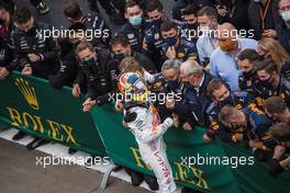 Sergio Perez (MEX) Red Bull Racing celebrates his third position with the team in parc ferme. 10.10.2021. Formula 1 World Championship, Rd 16, Turkish Grand Prix, Istanbul, Turkey, Race Day.