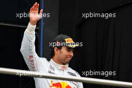 Sergio Perez (MEX) Red Bull Racing celebrates his third position on the podium. 10.10.2021. Formula 1 World Championship, Rd 16, Turkish Grand Prix, Istanbul, Turkey, Race Day.