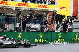 Race winner Valtteri Bottas (FIN) Mercedes AMG F1 W12 passes the team at the end of the race. 10.10.2021. Formula 1 World Championship, Rd 16, Turkish Grand Prix, Istanbul, Turkey, Race Day.