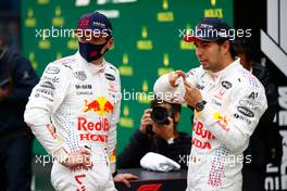 (L to R): Max Verstappen (NLD) Red Bull Racing with team mate Sergio Perez (MEX) Red Bull Racing in parc ferme. 10.10.2021. Formula 1 World Championship, Rd 16, Turkish Grand Prix, Istanbul, Turkey, Race Day.