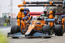 Lando Norris (GBR) McLaren MCL35M makes a pit stop. 10.10.2021. Formula 1 World Championship, Rd 16, Turkish Grand Prix, Istanbul, Turkey, Race Day.