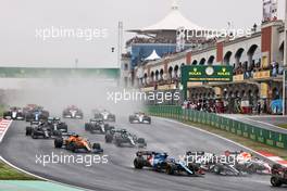 (L to R): Fernando Alonso (ESP) Alpine F1 Team A521, Pierre Gasly (FRA) AlphaTauri AT02, and Sergio Perez (MEX) Red Bull Racing RB16B at the start of the race. 10.10.2021. Formula 1 World Championship, Rd 16, Turkish Grand Prix, Istanbul, Turkey, Race Day.
