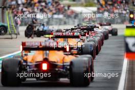Daniel Ricciardo (AUS) McLaren MCL35M ahead of team mate Lando Norris (GBR) McLaren MCL35M at the end of a queue exiting the pits during qualifying. 09.10.2021. Formula 1 World Championship, Rd 16, Turkish Grand Prix, Istanbul, Turkey, Qualifying Day.
