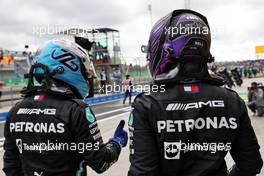 (L to R): Pole sitter Valtteri Bottas (FIN) Mercedes AMG F1 with team mate and fastest in qualifying Lewis Hamilton (GBR) Mercedes AMG F1 in parc ferme. 09.10.2021. Formula 1 World Championship, Rd 16, Turkish Grand Prix, Istanbul, Turkey, Qualifying Day.