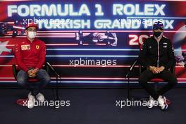 (L to R): Charles Leclerc (MON) Ferrari and Esteban Ocon (FRA) Alpine F1 Team in the FIA Press Conference. 07.10.2021. Formula 1 World Championship, Rd 16, Turkish Grand Prix, Istanbul, Turkey, Preparation Day.