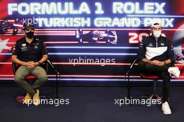 (L to R): Sergio Perez (MEX) Red Bull Racing and Pierre Gasly (FRA) AlphaTauri in the FIA Press Conference. 07.10.2021. Formula 1 World Championship, Rd 16, Turkish Grand Prix, Istanbul, Turkey, Preparation Day.