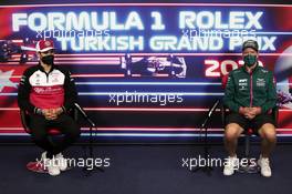 (L to R): Antonio Giovinazzi (ITA) Alfa Romeo Racing and Sebastian Vettel (GER) Aston Martin F1 Team in the FIA Press Conference. 07.10.2021. Formula 1 World Championship, Rd 16, Turkish Grand Prix, Istanbul, Turkey, Preparation Day.