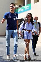 George Russell (GBR) Williams Racing with his girlfriend Carmen Montero Mundt. 10.12.2021. Formula 1 World Championship, Rd 22, Abu Dhabi Grand Prix, Yas Marina Circuit, Abu Dhabi, Practice Day.