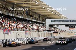 Daniel Ricciardo (AUS) McLaren MCL35M and Lando Norris (GBR) McLaren MCL35M practice starts. 10.12.2021. Formula 1 World Championship, Rd 22, Abu Dhabi Grand Prix, Yas Marina Circuit, Abu Dhabi, Practice Day.
