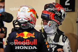 (L to R): Race winner and World Champion Max Verstappen (NLD) Red Bull Racing celebrates in parc ferme with Pierre Gasly (FRA) AlphaTauri. 12.12.2021. Formula 1 World Championship, Rd 22, Abu Dhabi Grand Prix, Yas Marina Circuit, Abu Dhabi, Race Day.