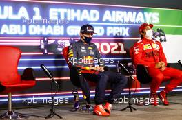 (L to R): Max Verstappen (NLD) Red Bull Racing and Carlos Sainz Jr (ESP) Ferrari in the post race FIA Press Conference. 12.12.2021. Formula 1 World Championship, Rd 22, Abu Dhabi Grand Prix, Yas Marina Circuit, Abu Dhabi, Race Day.