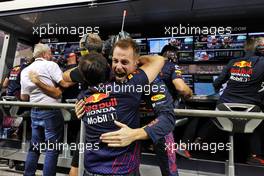 Red Bull Racing celebrates Max Verstappen (NLD) Red Bull Racing RB16B winning the race and the World Championship. 12.12.2021. Formula 1 World Championship, Rd 22, Abu Dhabi Grand Prix, Yas Marina Circuit, Abu Dhabi, Race Day.