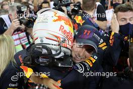 1st place and new World Champion, Max Verstappen (NLD) Red Bull Racing RB16B withj Sergio Perez (MEX) Red Bull Racing RB16B. 12.12.2021. Formula 1 World Championship, Rd 22, Abu Dhabi Grand Prix, Yas Marina Circuit, Abu Dhabi, Race Day.