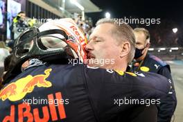 1st place and new World Champion, Max Verstappen (NLD) Red Bull Racing RB16B with Jos Verstappen (NLD). 12.12.2021. Formula 1 World Championship, Rd 22, Abu Dhabi Grand Prix, Yas Marina Circuit, Abu Dhabi, Race Day.