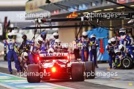 Mick Schumacher (GER) Haas VF-21 makes a pit stop. 12.12.2021. Formula 1 World Championship, Rd 22, Abu Dhabi Grand Prix, Yas Marina Circuit, Abu Dhabi, Race Day.