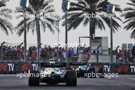 Lance Stroll (CDN) Aston Martin F1 Team AMR21 leads Sebastian Vettel (GER) Aston Martin F1 Team AMR21. 12.12.2021. Formula 1 World Championship, Rd 22, Abu Dhabi Grand Prix, Yas Marina Circuit, Abu Dhabi, Race Day.