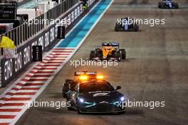 Lewis Hamilton (GBR) Mercedes AMG F1 W12 leads behind the Aston Martin FIA Safety Car. 12.12.2021. Formula 1 World Championship, Rd 22, Abu Dhabi Grand Prix, Yas Marina Circuit, Abu Dhabi, Race Day.