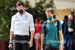 (L to R): Toto Wolff (GER) Mercedes AMG F1 Shareholder and Executive Director with Sebastian Vettel (GER) Aston Martin F1 Team. 11.12.2021. Formula 1 World Championship, Rd 22, Abu Dhabi Grand Prix, Yas Marina Circuit, Abu Dhabi, Qualifying Day.