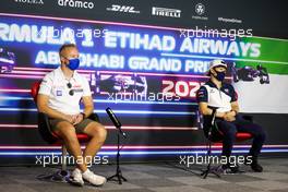 (L to R): Nikita Mazepin (RUS) Haas F1 Team and Yuki Tsunoda (JPN) AlphaTauri in the FIA Press Conference. 09.12.2021. Formula 1 World Championship, Rd 22, Abu Dhabi Grand Prix, Yas Marina Circuit, Abu Dhabi, Preparation Day.