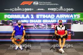 (L to R): Esteban Ocon (FRA) Alpine F1 Team and Antonio Giovinazzi (ITA) Alfa Romeo Racing in the FIA Press Conference. 09.12.2021. Formula 1 World Championship, Rd 22, Abu Dhabi Grand Prix, Yas Marina Circuit, Abu Dhabi, Preparation Day.