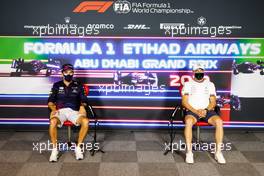(L to R): Sergio Perez (MEX) Red Bull Racing and Valtteri Bottas (FIN) Mercedes AMG F1 in the FIA Press Conference. 09.12.2021. Formula 1 World Championship, Rd 22, Abu Dhabi Grand Prix, Yas Marina Circuit, Abu Dhabi, Preparation Day.