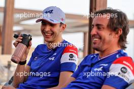(L to R): Esteban Ocon (FRA) Alpine F1 Team with Fernando Alonso (ESP) Alpine F1 Team. 09.12.2021. Formula 1 World Championship, Rd 22, Abu Dhabi Grand Prix, Yas Marina Circuit, Abu Dhabi, Preparation Day.