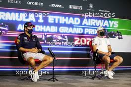 (L to R): Sergio Perez (MEX) Red Bull Racing and Valtteri Bottas (FIN) Mercedes AMG F1 in the FIA Press Conference. 09.12.2021. Formula 1 World Championship, Rd 22, Abu Dhabi Grand Prix, Yas Marina Circuit, Abu Dhabi, Preparation Day.